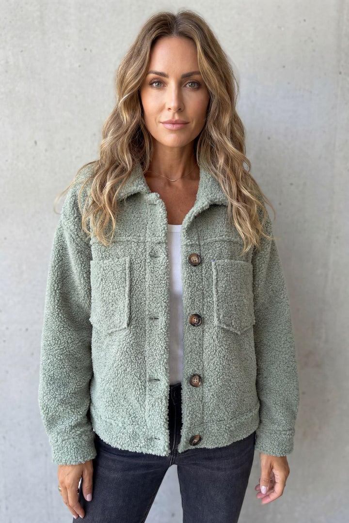 Veste en polaire texturée boutonnée avec poches avant pour femme