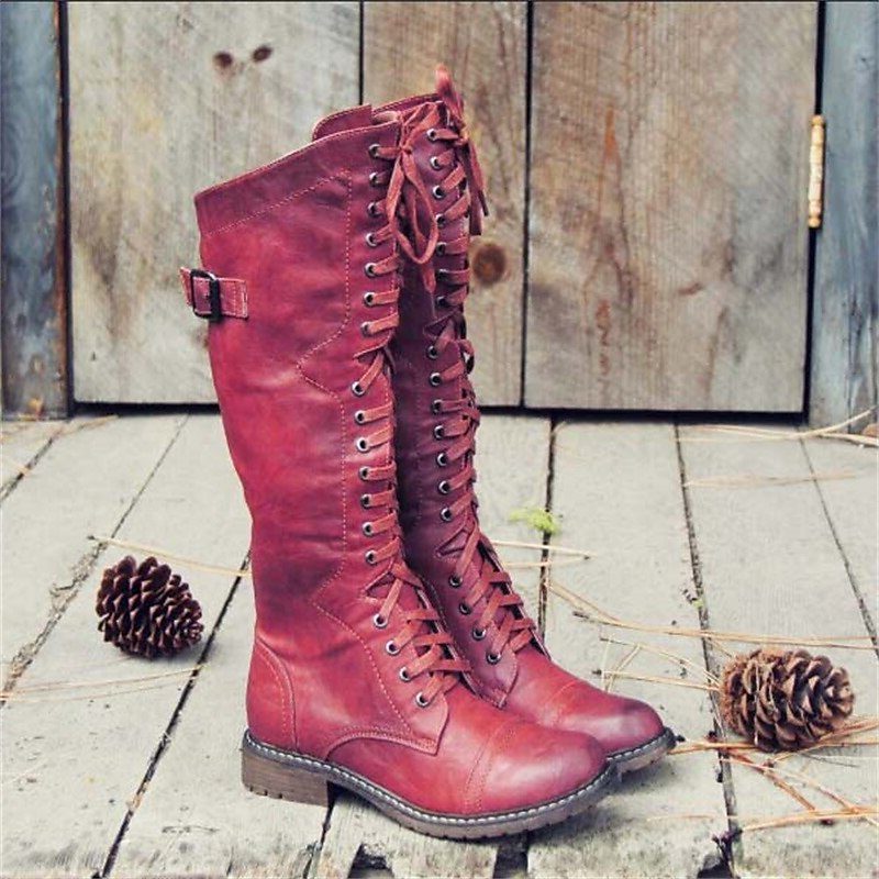 Bottes hautes jusqu'au genou pour femme en cuir avec laçage à l'avant