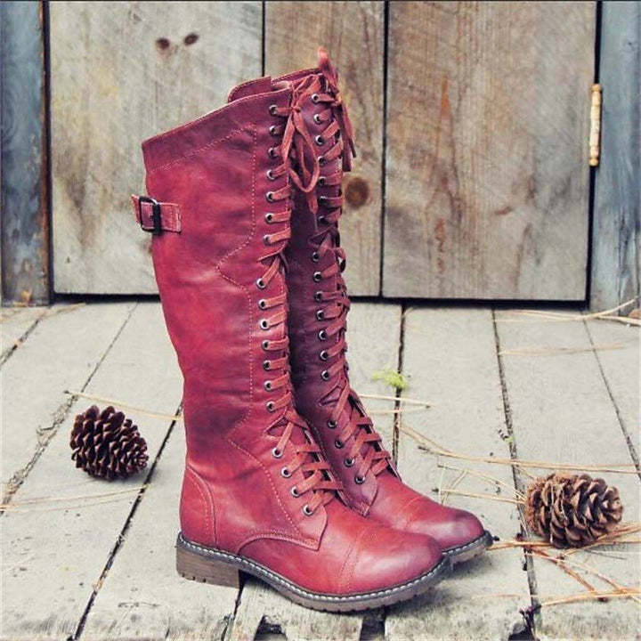 Bottes hautes jusqu'au genou pour femme en cuir avec laçage à l'avant