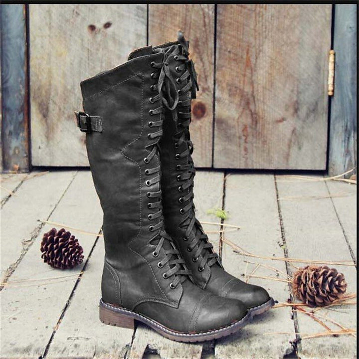 Bottes hautes jusqu'au genou pour femme en cuir avec laçage à l'avant
