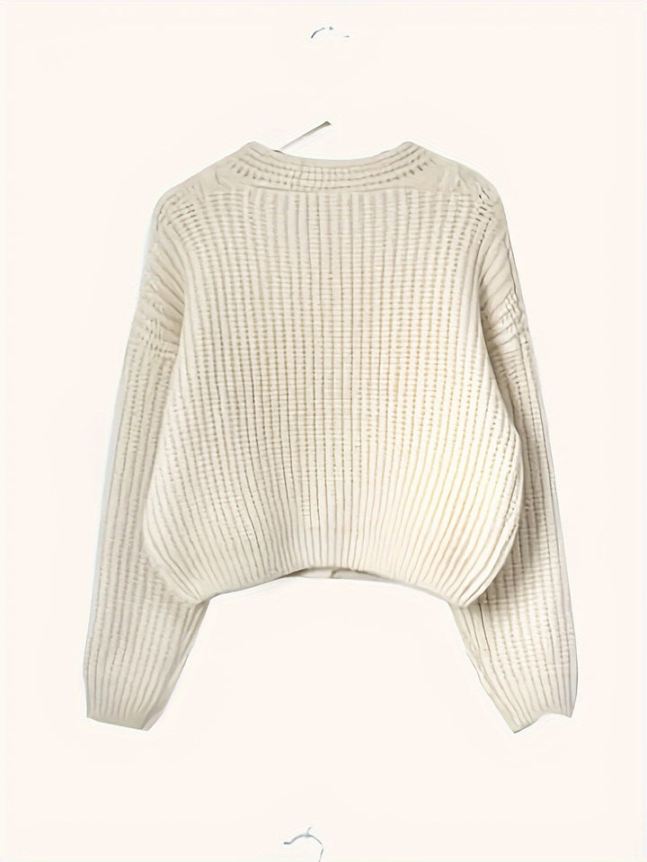 Gilet pour femme en grosse maille torsadée, avec boutonnage sur le devant