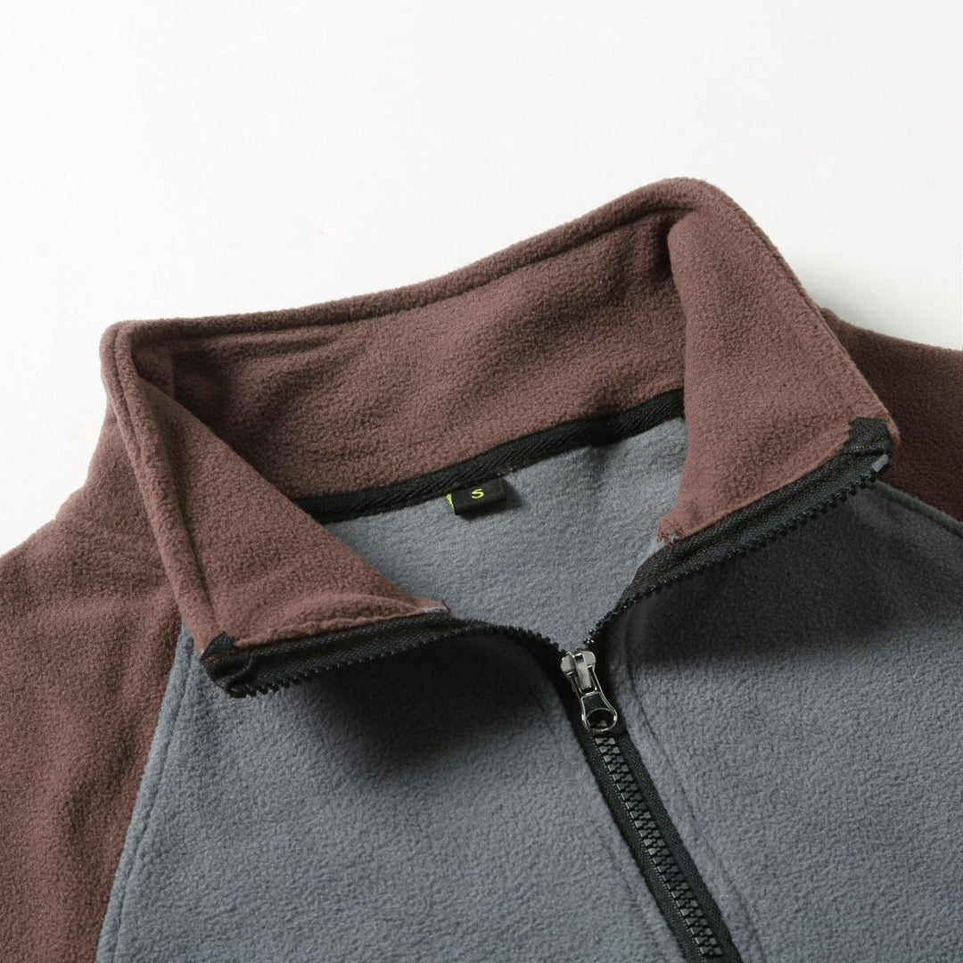 Pull polaire pour homme à fermeture zippée au quart avec motif à empiècements de couleurs